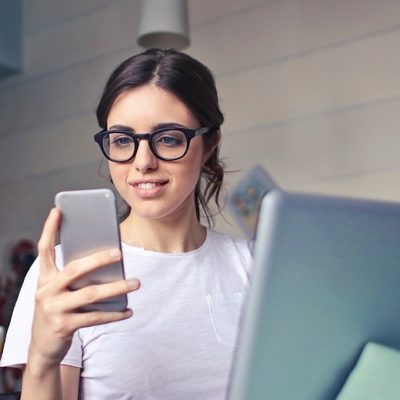 Woman working with Apple Business Manager