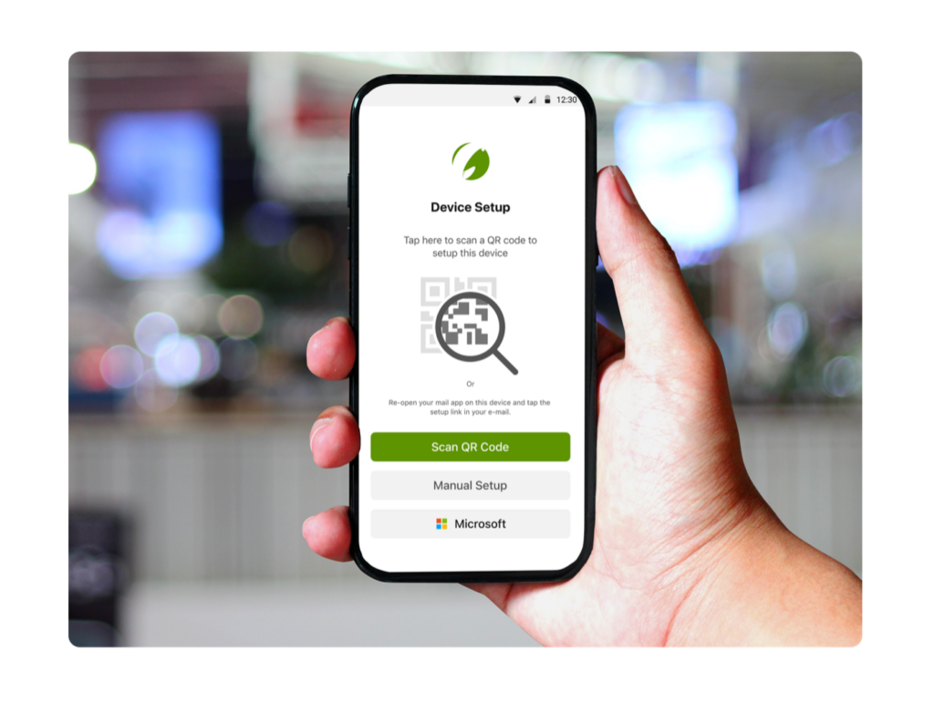 Phone with button to scan QR code for automatic setup.
