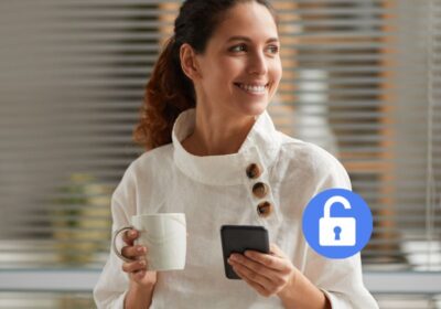 Woman with Smartphone and Coffee